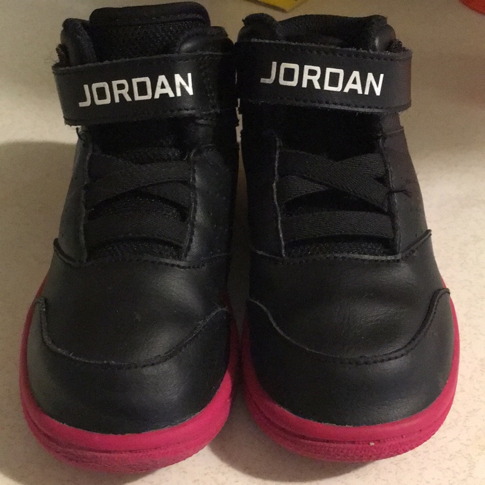 Black and pink nike Jordan’s children sz9